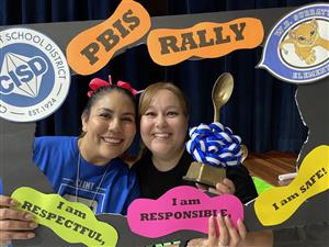 Teachers with PBIS Golden Spoon