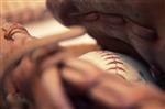 softball in a glove 